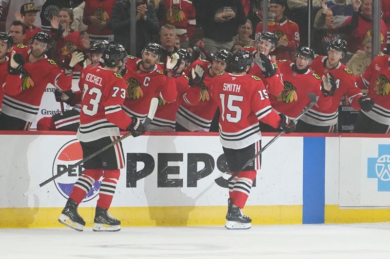 Oct 25, 2024; Chicago, Illinois, USA; Chicago Blackhawks center Craig Smith (15) celebrates his goal against the Nashville Predators during the first period at the United Center. Mandatory Credit: David Banks-Imagn Images