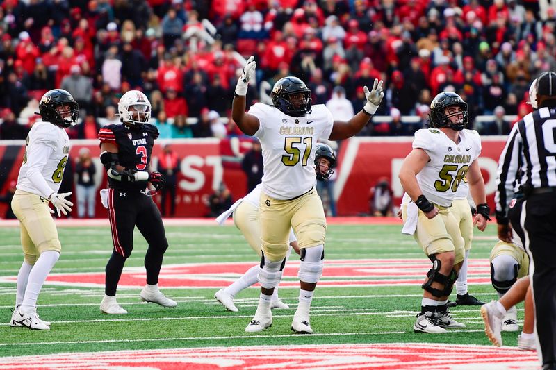 Nov 25, 2023; Salt Lake City, Utah, USA; Colorado Buffaloes offensive tackle Isaiah Jatta (51) reacts after a field goal against the Utah Utes at Rice-Eccles Stadium. Mandatory Credit: Christopher Creveling-USA TODAY Sports