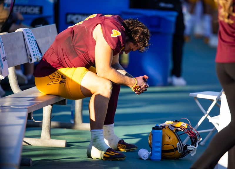 Nov 25, 2023; Tempe, Arizona, USA; Arizona State Sun Devils running back Cameron Skattebo (4) reacts on the bench against the Arizona Wildcats in the second half of the Territorial Cup at Mountain America Stadium. Mandatory Credit: Mark J. Rebilas-USA TODAY Sports