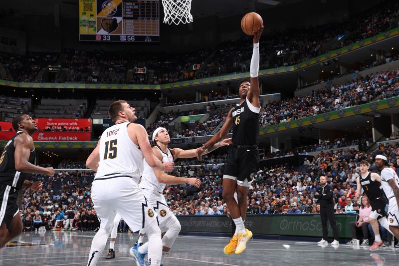 MEMPHIS, TN - APRIL 14: GG Jackson #45 of the Memphis Grizzlies drives to the basket during the game against the Denver Nuggets on April 14, 2024 at FedExForum in Memphis, Tennessee. NOTE TO USER: User expressly acknowledges and agrees that, by downloading and or using this photograph, User is consenting to the terms and conditions of the Getty Images License Agreement. Mandatory Copyright Notice: Copyright 2024 NBAE (Photo by Joe Murphy/NBAE via Getty Images)