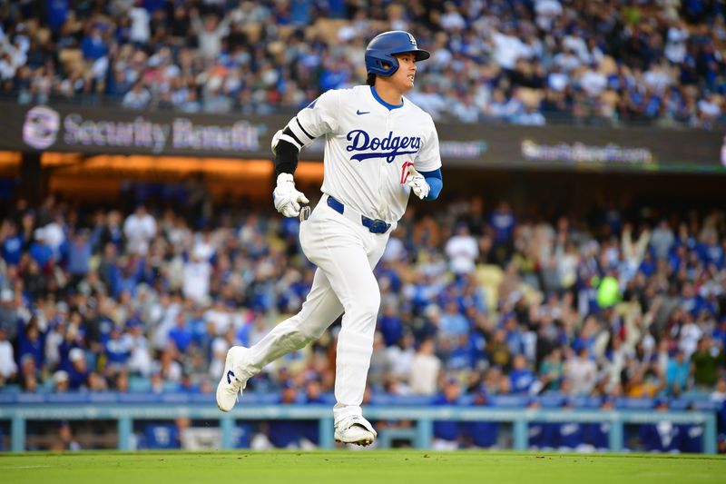 May 4, 2024; Los Angeles, California, USA; Los Angeles Dodgers designated hitter Shohei Ohtani (17) runs the bases after hitting a solo home run against the Atlanta Braves during the third inning at Dodger Stadium. Mandatory Credit: Gary A. Vasquez-USA TODAY Sports