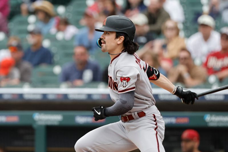 Jun 11, 2023; Detroit, Michigan, USA; Arizona Diamondbacks left fielder Corbin Carroll (7) hits a triple in the first inning against the Detroit Tigers at Comerica Park. Mandatory Credit: Rick Osentoski-USA TODAY Sports