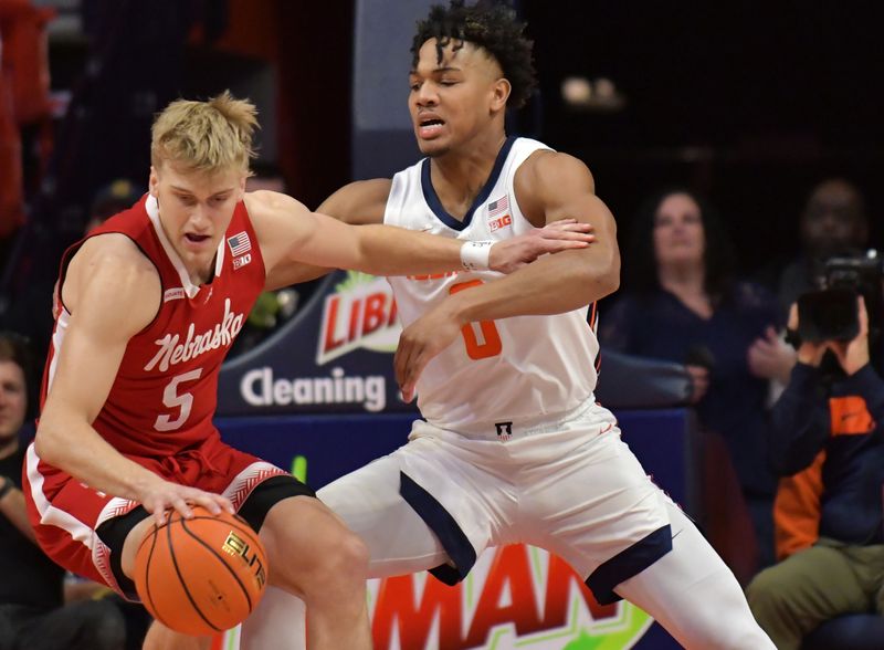 Jan 31, 2023; Champaign, Illinois, USA; Illinois Fighting Illini guard Terrence Shannon Jr. (0) pressures Nebraska Cornhuskers guard Sam Griesel (5) during the first half at State Farm Center. Mandatory Credit: Ron Johnson-USA TODAY Sports