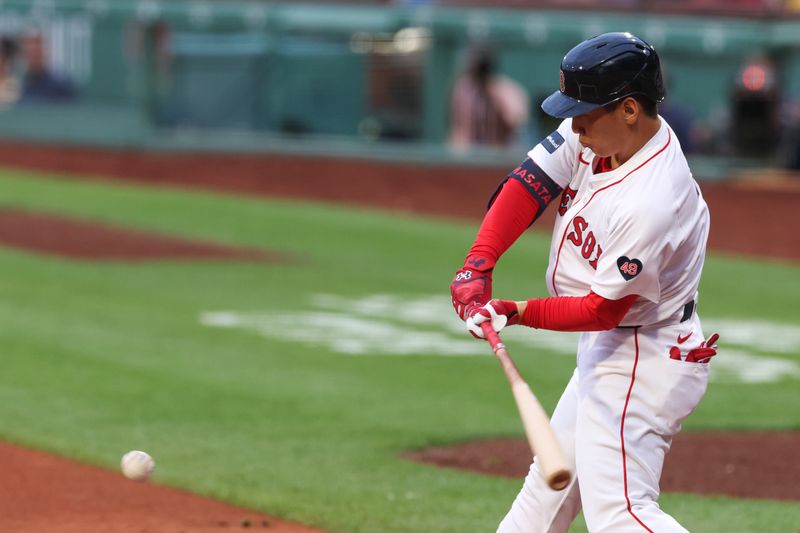 Jun 11, 2024; Boston, Massachusetts, USA; Boston Red Sox designated hitter Masatka Yoshida (7) at bat during the first inning against the Philadelphia Phillies at Fenway Park. Mandatory Credit: Paul Rutherford-USA TODAY Sports