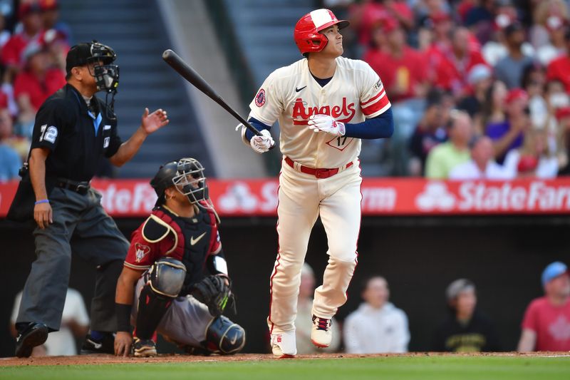 Jul 1, 2023; Anaheim, California, USA; Los Angeles Angels designated hitter Shohei Ohtani (17) runs out a fly ball against the Arizona Diamondbacks during the first inning at Angel Stadium. Mandatory Credit: Gary A. Vasquez-USA TODAY Sports