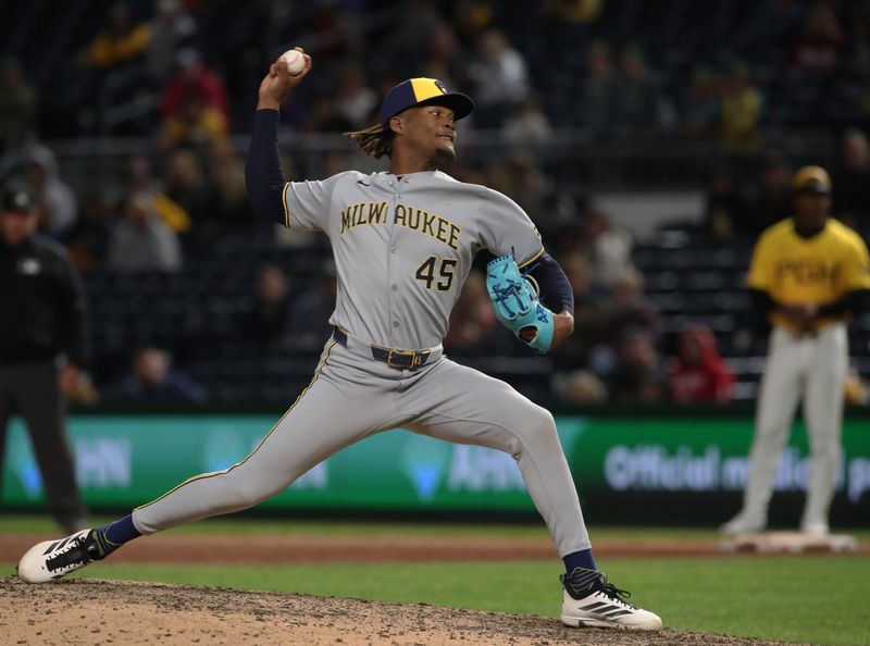 May 23, 2025; Pittsburgh, Pennsylvania, USA;  Milwaukee Brewers relief pitcher Abner Uribe (45) pitches against the Pittsburgh Pirates during the ninth inning at PNC Park. Mandatory Credit: Charles LeClaire-Imagn Images