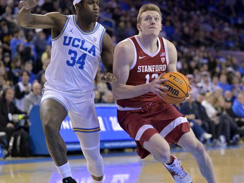 Feb 16, 2023; Los Angeles, California, USA; Stanford Cardinal forward Spencer Jones (14) is defended by UCLA Bruins guard David Singleton (34) in the first half at Pauley Pavilion presented by Wescom. Mandatory Credit: Jayne Kamin-Oncea-USA TODAY Sports