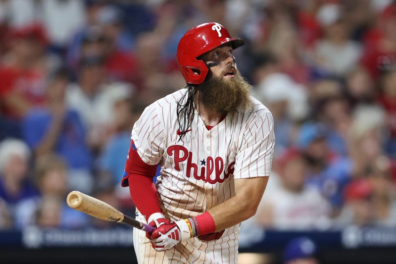 Jul 9, 2024; Philadelphia, Pennsylvania, USA; Philadelphia Phillies outfielder Brandon Marsh (16) hits a home run during the seventh inning against the Los Angeles Dodgers at Citizens Bank Park. Mandatory Credit: Bill Streicher-USA TODAY Sports