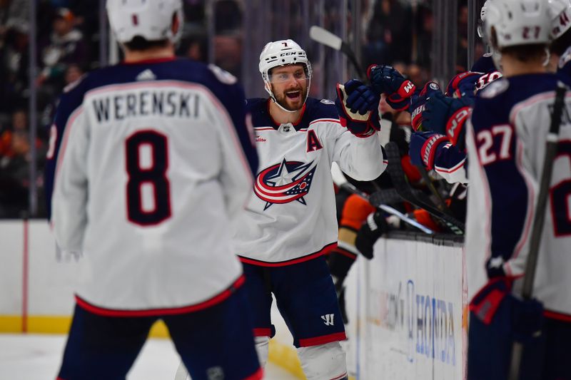 Feb 21, 2024; Anaheim, California, USA; Columbus Blue Jackets center Sean Kuraly (7) celebrates his goal scored against the Anaheim Ducks during the third period at Honda Center. Mandatory Credit: Gary A. Vasquez-USA TODAY Sports