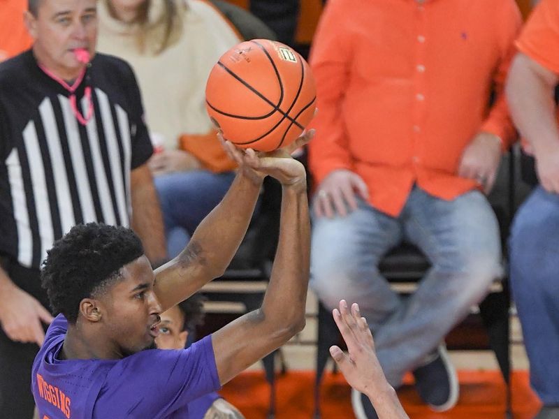 Jan 24, 2023; Clemson, South Carolina, USA; Clemson Tigers forward Chauncey Wiggins (21) shoots against the Georgia Tech Yellow Jackets during the first half at Littlejohn Coliseum. Mandatory Credit: Ken Ruinard-USA TODAY Sports