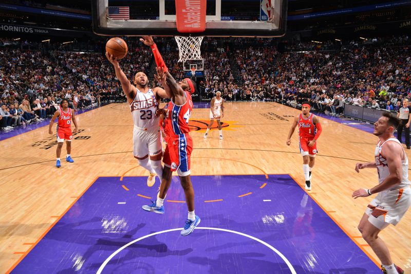 PHOENIX, AZ - MARCH 20:  Eric Gordon #23 of the Phoenix Suns drives to the basket during the game against the Philadelphia 76ers on March 20, 2024 at Footprint Center in Phoenix, Arizona. NOTE TO USER: User expressly acknowledges and agrees that, by downloading and or using this photograph, user is consenting to the terms and conditions of the Getty Images License Agreement. Mandatory Copyright Notice: Copyright 2024 NBAE (Photo by Barry Gossage/NBAE via Getty Images)
