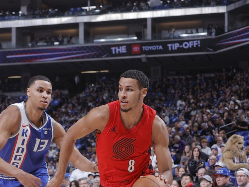 SACRAMENTO, CA - APRIL 14:  Kris Murray #8 of the Portland Trail Blazers goes to the basket during the game against Keegan Murray #13 of the Sacramento Kings on April 14, 2024 at Golden 1 Center in Sacramento, California. NOTE TO USER: User expressly acknowledges and agrees that, by downloading and or using this Photograph, user is consenting to the terms and conditions of the Getty Images License Agreement. Mandatory Copyright Notice: Copyright 2024 NBAE (Photo by Rocky Widner/NBAE via Getty Images)