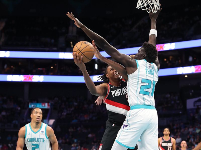 CHARLOTTE, NC - APRIL 3:  Jabari Walker #34 of the Portland Trail Blazers drives to the basket during the game against the Charlotte Hornets on April 3, 2024 at Spectrum Center in Charlotte, North Carolina. NOTE TO USER: User expressly acknowledges and agrees that, by downloading and or using this photograph, User is consenting to the terms and conditions of the Getty Images License Agreement.  Mandatory Copyright Notice:  Copyright 2024 NBAE (Photo by Brock Williams-Smith/NBAE via Getty Images)