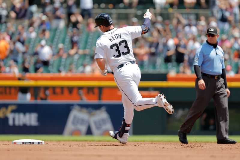 Jun 23, 2024; Detroit, Michigan, USA;  Detroit Tigers second baseman Colt Keith (33) rounds the bases after hitting a two-run home run in the first inning against the Chicago White Sox at Comerica Park. Mandatory Credit: Rick Osentoski-USA TODAY Sports