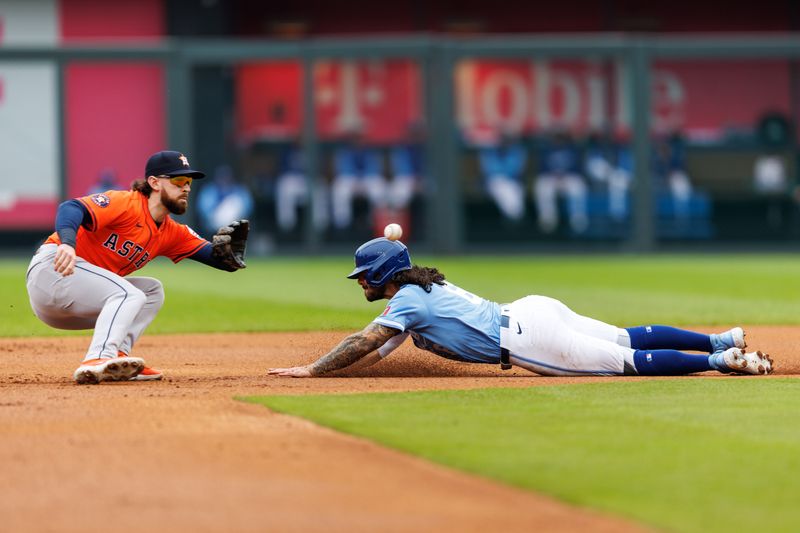 Apr 27, 2025; Kansas City, Missouri, USA; Kansas City Royals third baseman Jonathan India (6) dives into second under a throw to Houston Astros second baseman Brendan Rodgers (1) during the first inning at Kauffman Stadium. Mandatory Credit: William Purnell-Imagn Images