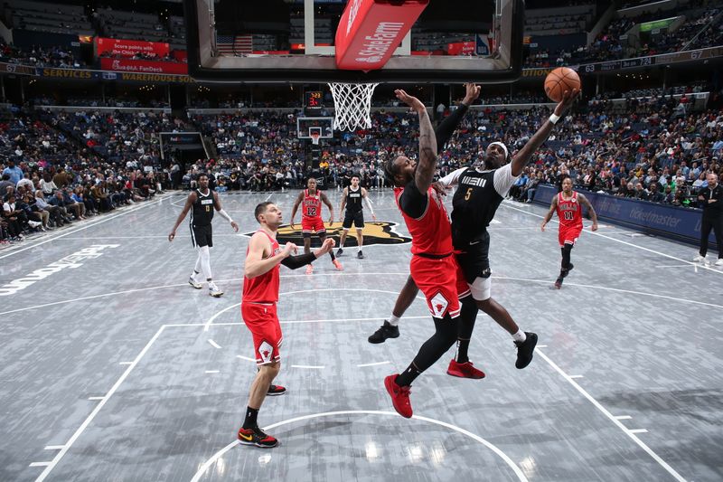 MEMPHIS, TN - FEBRUARY 8: Vince Williams Jr. #5 of the Memphis Grizzlies drives to the basket during the game against the Chicago Bulls on February 8, 2024 at FedExForum in Memphis, Tennessee. NOTE TO USER: User expressly acknowledges and agrees that, by downloading and or using this photograph, User is consenting to the terms and conditions of the Getty Images License Agreement. Mandatory Copyright Notice: Copyright 2024 NBAE (Photo by Joe Murphy/NBAE via Getty Images)