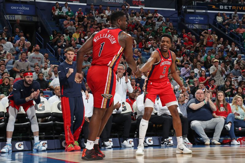 NEW ORLEANS, LA - MARCH 30: Zion Williamson #1 of the New Orleans Pelicans celebrates during the game with Herb Jones #5 against the Boston Celtics on March 30, 2024 at the Smoothie King Center in New Orleans, Louisiana. NOTE TO USER: User expressly acknowledges and agrees that, by downloading and or using this Photograph, user is consenting to the terms and conditions of the Getty Images License Agreement. Mandatory Copyright Notice: Copyright 2024 NBAE (Photo by Layne Murdoch Jr./NBAE via Getty Images)