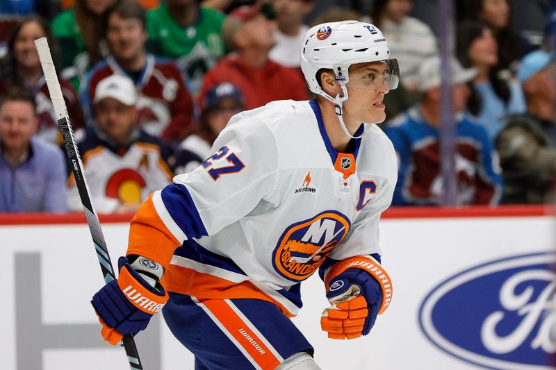 Oct 14, 2024; Denver, Colorado, USA; New York Islanders left wing Anders Lee (27) reacts after his goal in the first period against the Colorado Avalanche at Ball Arena. Mandatory Credit: Isaiah J. Downing-Imagn Images