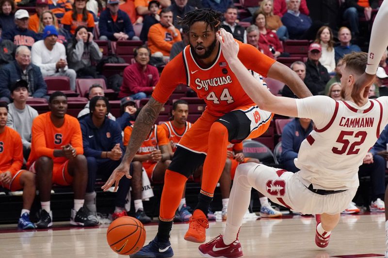 Jan 29, 2025; Stanford, California, USA;  Syracuse Orange center Eddie Lampkin Jr. (44) drives on Stanford Cardinal forward Aidan Cammann (52) in the second half at Maples Pavilion. Mandatory Credit: David Gonzales-Imagn Images