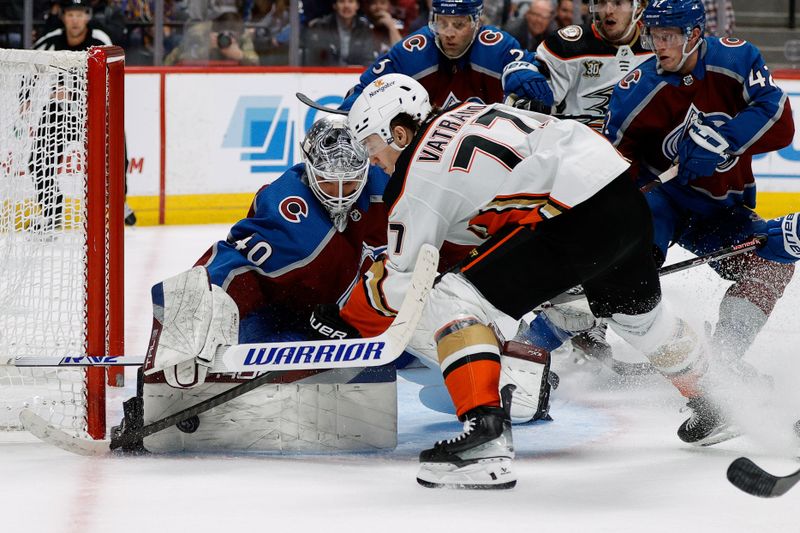 Dec 5, 2023; Denver, Colorado, USA; Colorado Avalanche goaltender Alexandar Georgiev (40) makes a save against Anaheim Ducks right wing Frank Vatrano (77) in the third period at Ball Arena. Mandatory Credit: Isaiah J. Downing-USA TODAY Sports