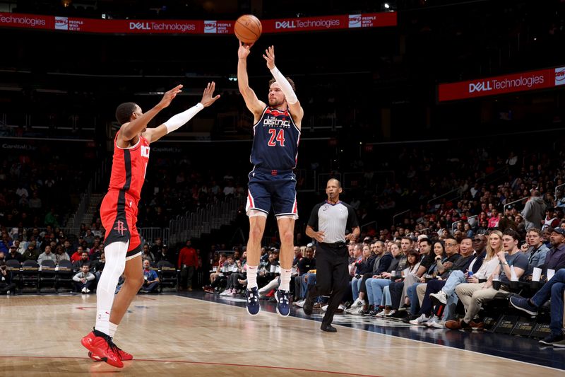 WASHINGTON, DC -? APRIL 9: Corey Kispert #24 of the Washington Wizards shoots a three point basket against the Houston Rockets  on April 9, 2023 at Capital One Arena in Washington, DC. NOTE TO USER: User expressly acknowledges and agrees that, by downloading and or using this Photograph, user is consenting to the terms and conditions of the Getty Images License Agreement. Mandatory Copyright Notice: Copyright 2023 NBAE (Photo by Stephen Gosling/NBAE via Getty Images)