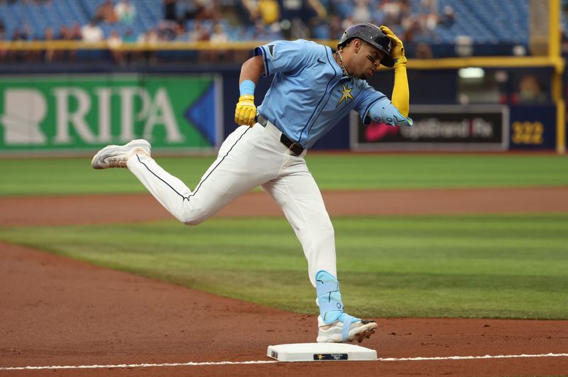 Jul 31, 2024; St. Petersburg, Florida, USA;  Tampa Bay Rays infielder Christopher Morel (24) runs around the bases after hitting a home run against the Miami Marlins during the first inning at Tropicana Field. Mandatory Credit: Kim Klement Neitzel-USA TODAY Sports