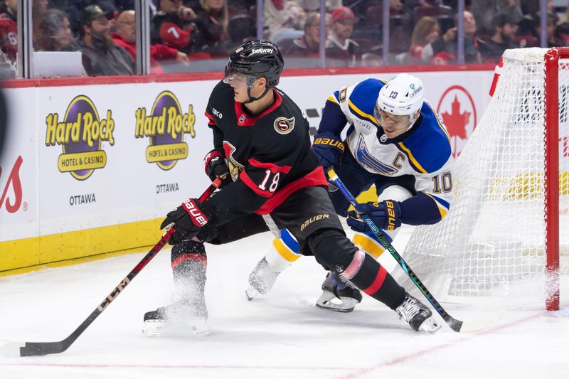 Oct 29, 2024; Ottawa, Ontario, CAN; Ottawa Senators center Tim Stutzle (18) moves the puck away from St. Louis Blues center Brayden Schenn (10) in the second period at the Canadian Tire Centre. Mandatory Credit: Marc DesRosiers-Imagn Images