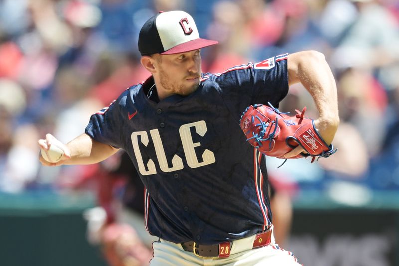 Jun 6, 2024; Cleveland, Ohio, USA; Cleveland Guardians starting pitcher Tanner Bibee (28) throws a pitch during the first inning against the Kansas City Royals at Progressive Field. Mandatory Credit: Ken Blaze-USA TODAY Sports