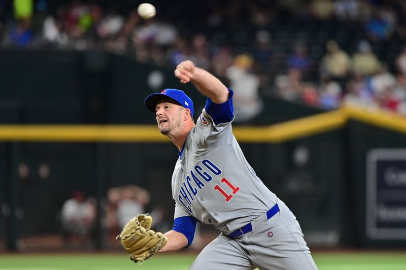 Apr 17, 2024; Phoenix, Arizona, USA; Chicago Cubs pitcher Drew Smyly (11) throws in the ninth inning against the Arizona Diamondbacks at Chase Field. Mandatory Credit: Matt Kartozian-USA TODAY Sports