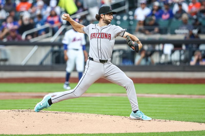 May 30, 2024; New York City, New York, USA; Arizona Diamondbacks starting pitcher Zac Gallen (23) pitches in the first inning against the New York Mets at Citi Field. Mandatory Credit: Wendell Cruz-USA TODAY Sports