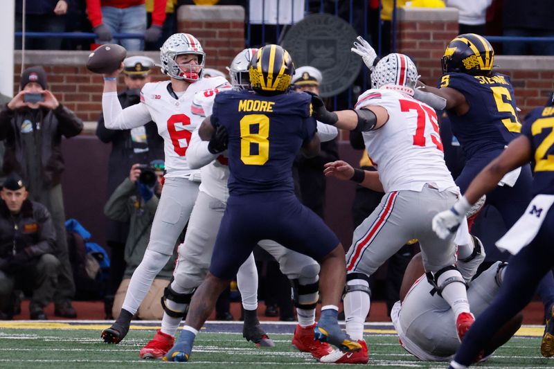 Nov 25, 2023; Ann Arbor, Michigan, USA; Ohio State Buckeyes quarterback Kyle McCord (6) passes in the second half against the Michigan Wolverines at Michigan Stadium. Mandatory Credit: Rick Osentoski-USA TODAY Sports