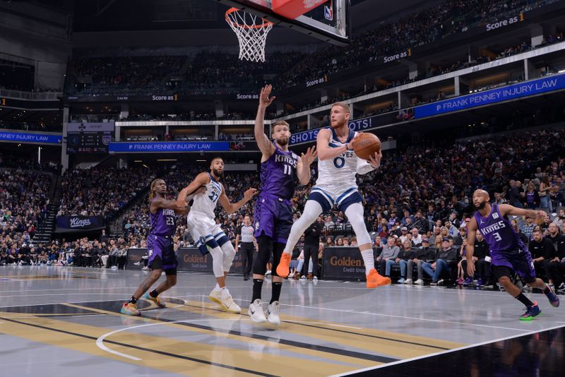 SACRAMENTO, CA - NOVEMBER 15: Donte DiVincenzo #0 of the Minnesota Timberwolves passes the ball during the game against the Sacramento Kings during the Emirates NBA Cup game on November 15, 2024 at Golden 1 Center in Sacramento, California. NOTE TO USER: User expressly acknowledges and agrees that, by downloading and or using this Photograph, user is consenting to the terms and conditions of the Getty Images License Agreement. Mandatory Copyright Notice: Copyright 2024 NBAE (Photo by Rocky Widner/NBAE via Getty Images)