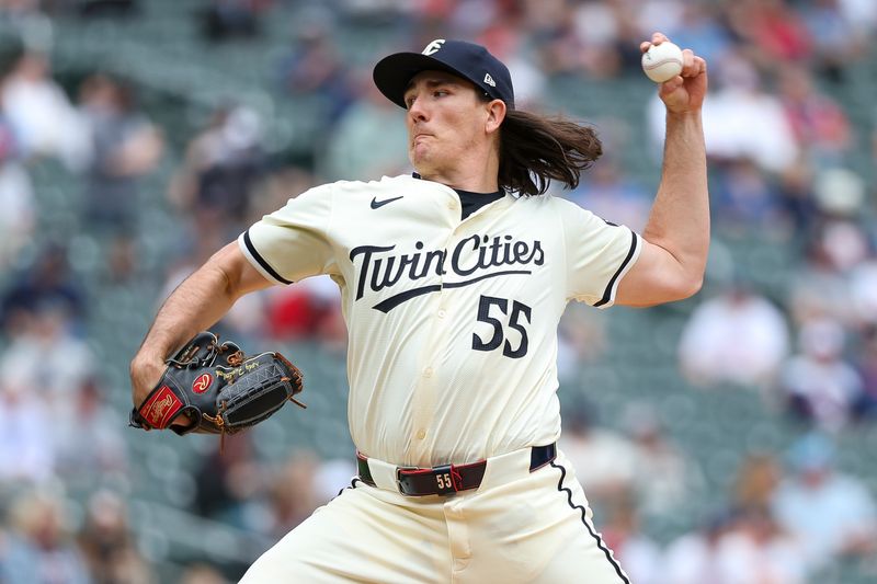 May 9, 2024; Minneapolis, Minnesota, USA; Minnesota Twins relief pitcher Kody Funderburk (55) delivers a pitch against the Seattle Mariners during the seventh inning at Target Field. Mandatory Credit: Matt Krohn-USA TODAY Sports