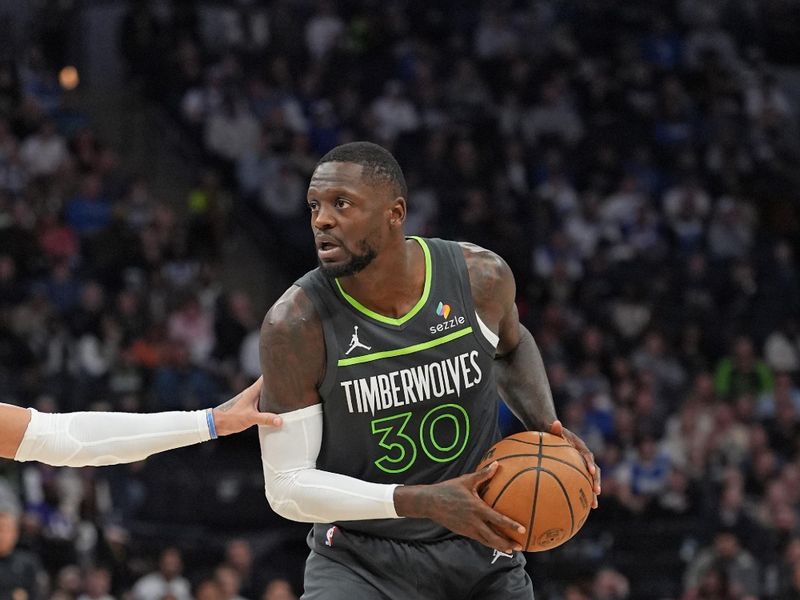 MINNEAPOLIS, MN - NOVEMBER 1: Julius Randle #30 of the Minnesota Timberwolves handles the ball during the game against the Denver Nuggets on November 1, 2024 at Target Center in Minneapolis, Minnesota. NOTE TO USER: User expressly acknowledges and agrees that, by downloading and or using this Photograph, user is consenting to the terms and conditions of the Getty Images License Agreement. Mandatory Copyright Notice: Copyright 2024 NBAE (Photo by Jordan Johnson/NBAE via Getty Images)