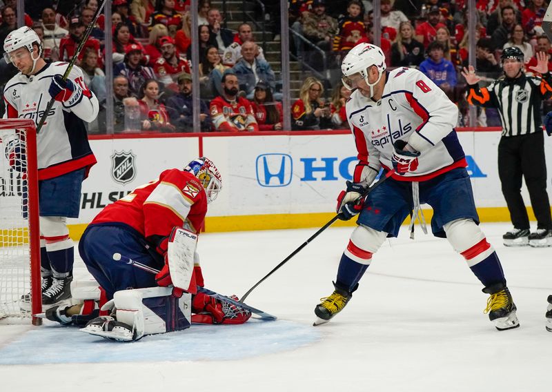 Dec 29, 2025; Sunrise, Florida, USA; Florida Panthers goaltender Sergei Bobrovsky (72) makes a save against Washington Capitals left wing Alex Ovechkin (8) during the second period at Amerant Bank Arena. Mandatory Credit: Jeff Romance-Imagn Images