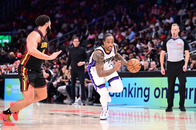 ATLANTA, GA - NOVEMBER 1: DeMar DeRozan #10 of the Sacramento Kings handles the ball during the game against the Atlanta Hawks on November 1, 2024 at State Farm Arena in Atlanta, Georgia.  NOTE TO USER: User expressly acknowledges and agrees that, by downloading and/or using this Photograph, user is consenting to the terms and conditions of the Getty Images License Agreement. Mandatory Copyright Notice: Copyright 2024 NBAE (Photo by Adam Hagy/NBAE via Getty Images)