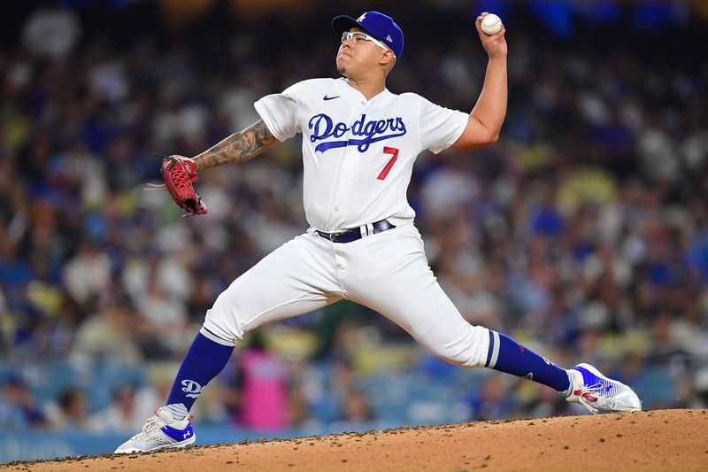 September 1, 2023; Los Angeles, California, USA; Los Angeles Dodgers starting pitcher Julio Urias (7) throws against the Atlanta Braves during the fifth inning at Dodger Stadium. Mandatory Credit: Gary A. Vasquez-USA TODAY Sports