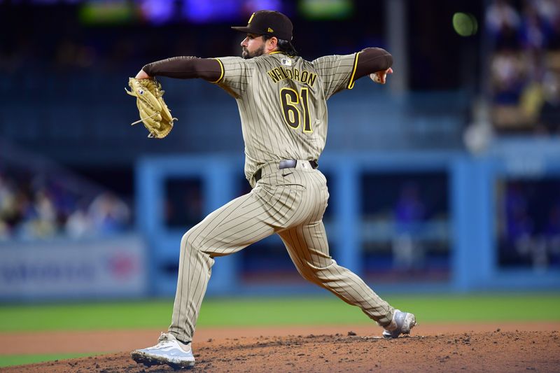 Apr 13, 2024; Los Angeles, California, USA; San Diego Padres starting pitcher Matt Waldron (61) throws against the Los Angeles Dodgers during the third inning at Dodger Stadium. Mandatory Credit: Gary A. Vasquez-USA TODAY Sports