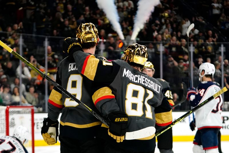 Mar 19, 2023; Las Vegas, Nevada, USA; Vegas Golden Knights center Jack Eichel (9) celebrates with center Jonathan Marchessault (81) after scoring a goal against the Columbus Blue Jackets during the second period at T-Mobile Arena. Mandatory Credit: Lucas Peltier-USA TODAY Sports