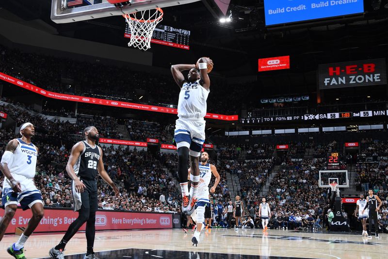 SAN ANTONIO, TX - NOVEMBER 2: Anthony Edwards #5 of the Minnesota Timberwolves drives to the basket during the game against the San Antonio Spurs on November 2, 2024 at the Frost Bank Center in San Antonio, Texas. NOTE TO USER: User expressly acknowledges and agrees that, by downloading and or using this photograph, user is consenting to the terms and conditions of the Getty Images License Agreement. Mandatory Copyright Notice: Copyright 2024 NBAE (Photos by Michael Gonzales/NBAE via Getty Images)