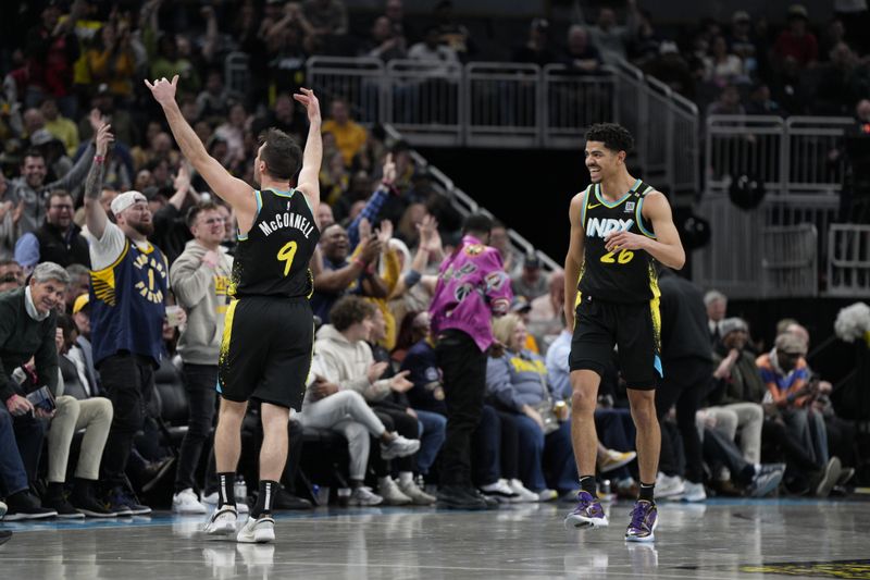 INDIANAPOLIS, IN - FEBRUARY 28: T.J. McConnell #9 and Ben Sheppard #26 of the Indiana Pacers celebrate during the game against the New Orleans Pelicans on February 28, 2024 at Gainbridge Fieldhouse in Indianapolis, Indiana. NOTE TO USER: User expressly acknowledges and agrees that, by downloading and or using this Photograph, user is consenting to the terms and conditions of the Getty Images License Agreement. Mandatory Copyright Notice: Copyright 2024 NBAE (Photo by Jeff Dean/NBAE via Getty Images)