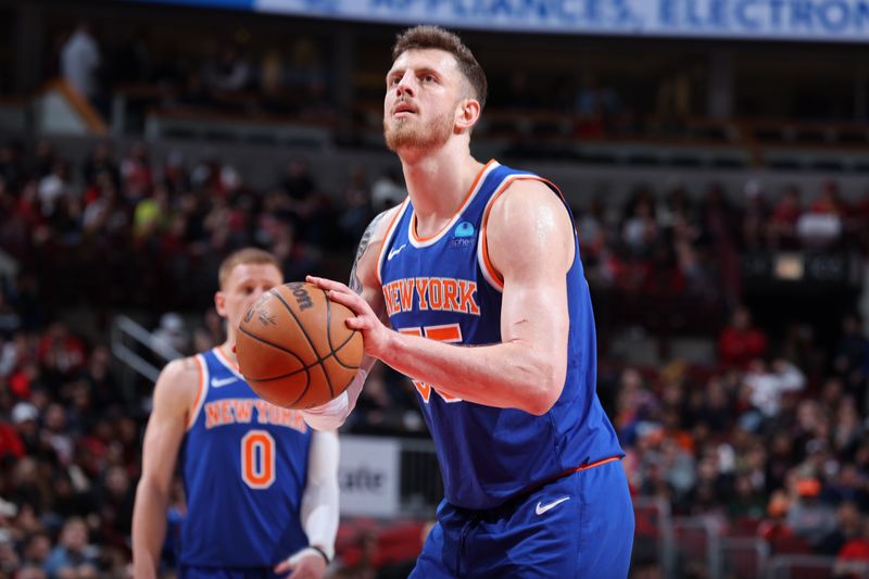 CHICAGO, IL - APRIL 9: Isaiah Hartenstein #55 of the New York Knicks prepares to shoot a free throw during the game against the Chicago Bulls on April 9, 2024 at United Center in Chicago, Illinois. NOTE TO USER: User expressly acknowledges and agrees that, by downloading and or using this photograph, User is consenting to the terms and conditions of the Getty Images License Agreement. Mandatory Copyright Notice: Copyright 2024 NBAE (Photo by Jeff Haynes/NBAE via Getty Images)