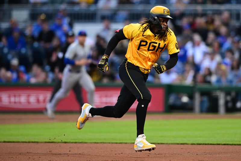 May 10, 2024; Pittsburgh, Pennsylvania, USA; Pittsburgh Pirates shortstop Oneil Cruz (15) runs before scoring in the first inning against the Chicago Cubs at PNC Park. Mandatory Credit: David Dermer-USA TODAY Sports