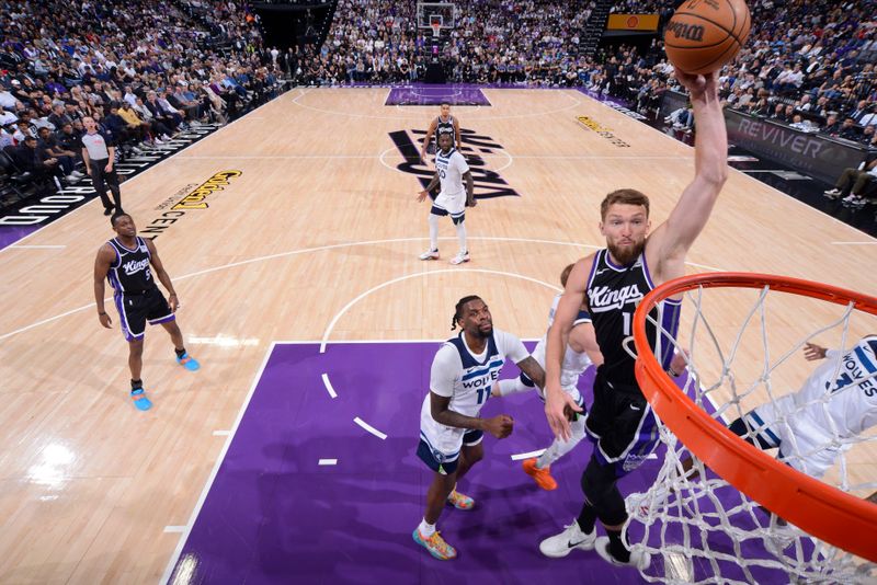 SACRAMENTO, CA - OCTOBER 24: Domantas Sabonis #11 of the Sacramento Kings dunks the ball during the game against the Minnesota Timberwolves on October 24, 2024 at Golden 1 Center in Sacramento, California. NOTE TO USER: User expressly acknowledges and agrees that, by downloading and or using this Photograph, user is consenting to the terms and conditions of the Getty Images License Agreement. Mandatory Copyright Notice: Copyright 2024 NBAE (Photo by Rocky Widner/NBAE via Getty Images)