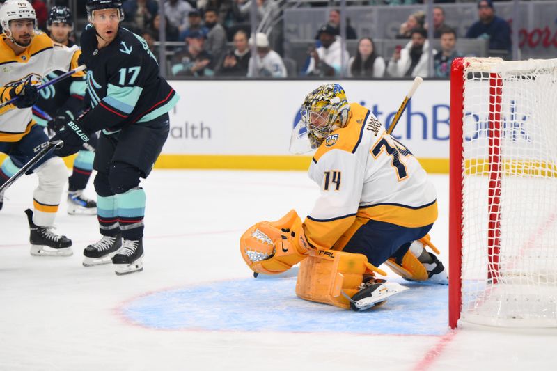 Nov 2, 2023; Seattle, Washington, USA; Nashville Predators goaltender Juuse Saros (74) defends the goal during the first period against the Seattle Kraken at Climate Pledge Arena. Mandatory Credit: Steven Bisig-USA TODAY Sports