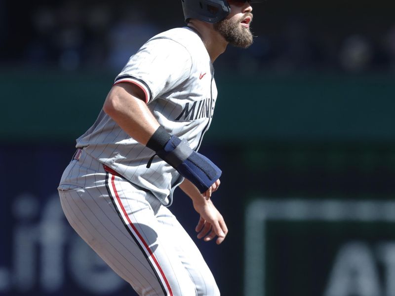 Jun 8, 2024; Pittsburgh, Pennsylvania, USA;  Minnesota Twins left fielder Alex Kirilloff (19) takes a lead off of second base against the Pittsburgh Pirates during the third inning at PNC Park. Mandatory Credit: Charles LeClaire-USA TODAY Sports