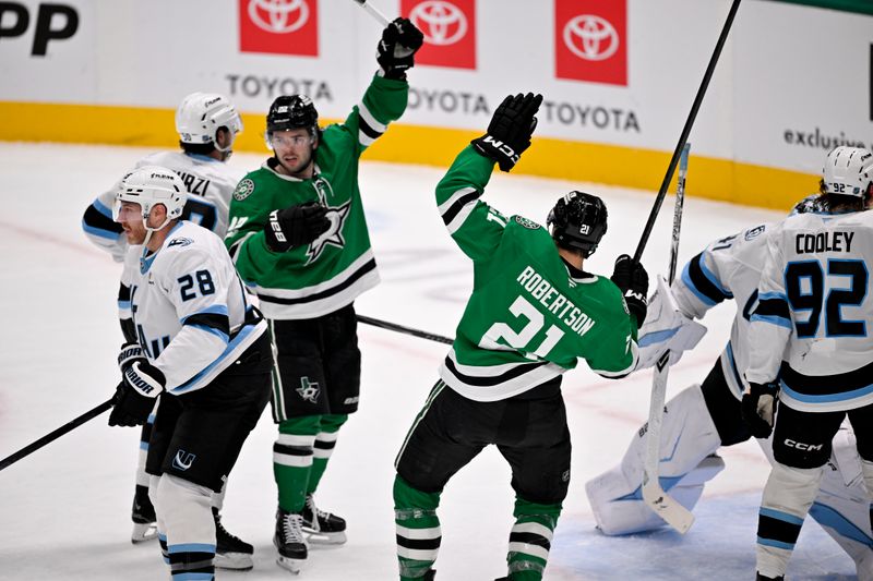 Mar 16, 2026; Dallas, Texas, USA; Dallas Stars center Mavrik Bourque (22) and center Mavrik Bourque (22) celebrates a goal scored by center Wyatt Johnston (not pictured) against the Utah Mammoth during the second period at the American Airlines Center. Mandatory Credit: Jerome Miron-Imagn Images