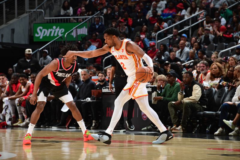 ATLANTA, GA - MARCH 27: Trent Forrest #2 of the Atlanta Hawks dribbles the ball during the game against the Portland Trail Blazers on March 27, 2024 at State Farm Arena in Atlanta, Georgia.  NOTE TO USER: User expressly acknowledges and agrees that, by downloading and/or using this Photograph, user is consenting to the terms and conditions of the Getty Images License Agreement. Mandatory Copyright Notice: Copyright 2024 NBAE (Photo by Scott Cunningham/NBAE via Getty Images)