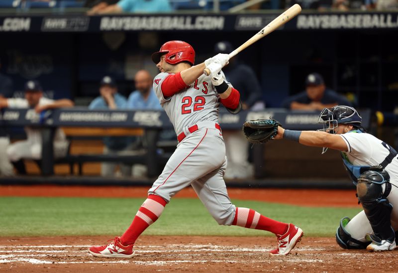 Sep 21, 2023; St. Petersburg, Florida, USA; Los Angeles Angels shortstop David Fletcher (22) hits a two-run RBI single against the Tampa Bay Rays during the fourth inning at Tropicana Field. Mandatory Credit: Kim Klement Neitzel-USA TODAY Sports