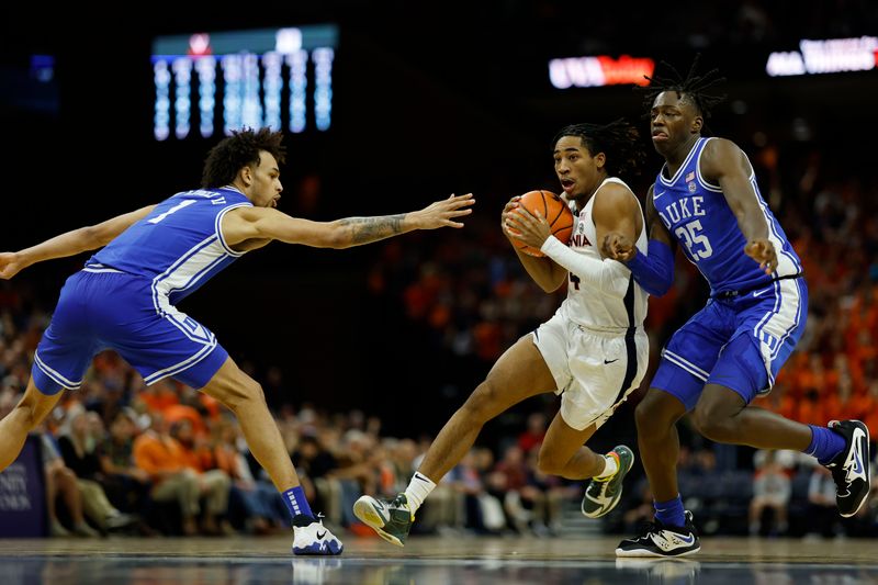 Feb 11, 2023; Charlottesville, Virginia, USA; Virginia Cavaliers guard Armaan Franklin (4) drives to the basket as Duke Blue Devils center Dereck Lively II (1) and Blue Devils forward Mark Mitchell (25) defend in the second half at John Paul Jones Arena. Mandatory Credit: Geoff Burke-USA TODAY Sports